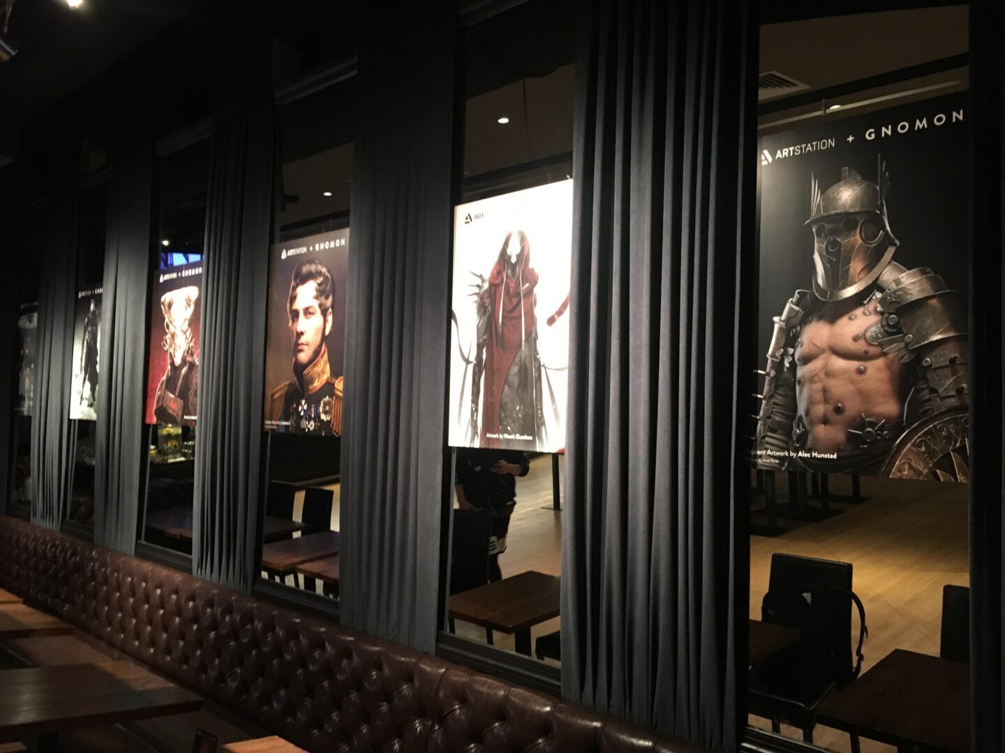 A room with several movie posters on the wall.