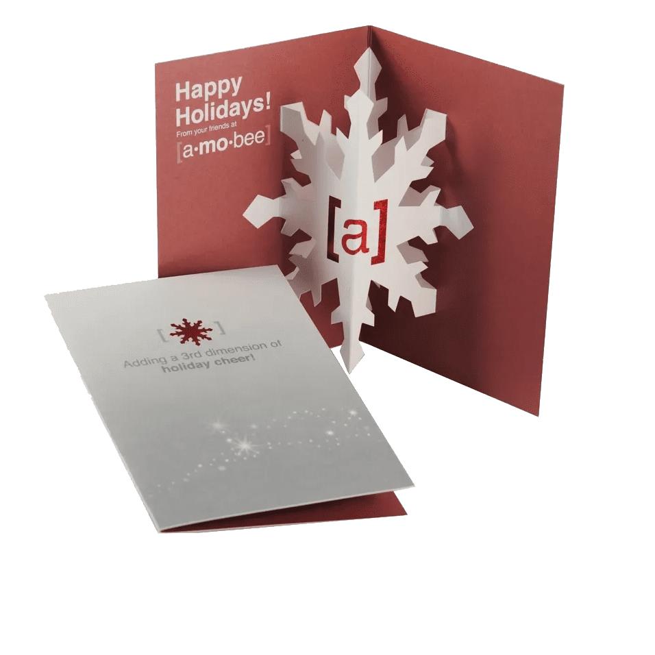 A christmas card with an open snowflake design.